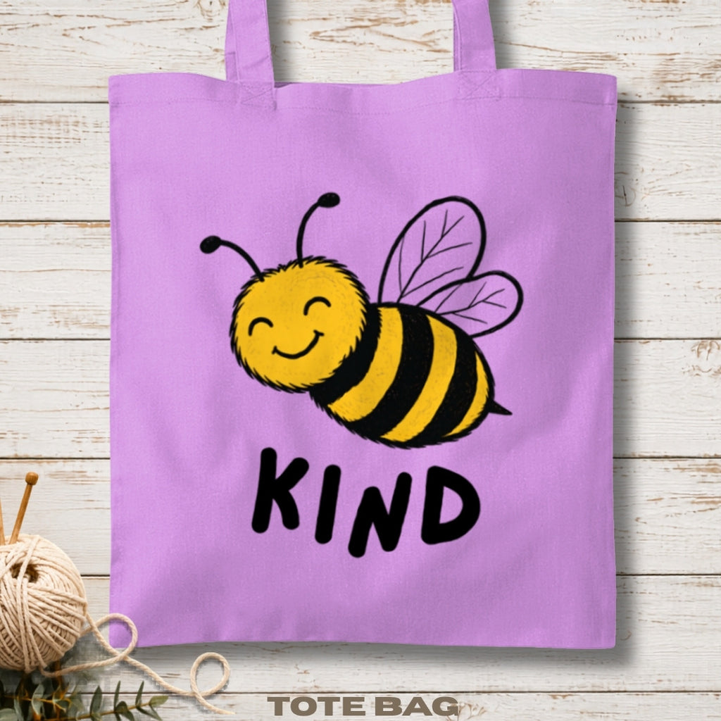 Purple tote bag with a bee illustration and 'Kind' text.