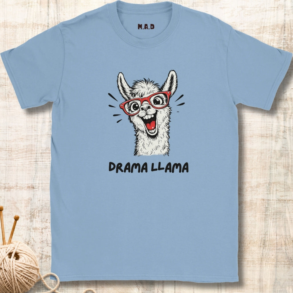 Light blue t-shirt with a graphic of a llama wearing glasses and the text 'Drama Llama' on a textured surface.