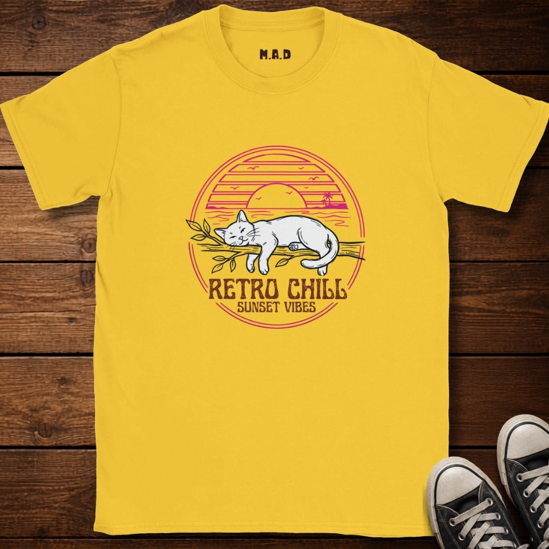 Yellow t-shirt with 'Retro Chill Sunset Vibes' design on a wooden surface